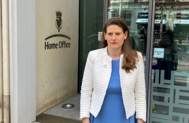 Theo Clarke MP outside the Home Office